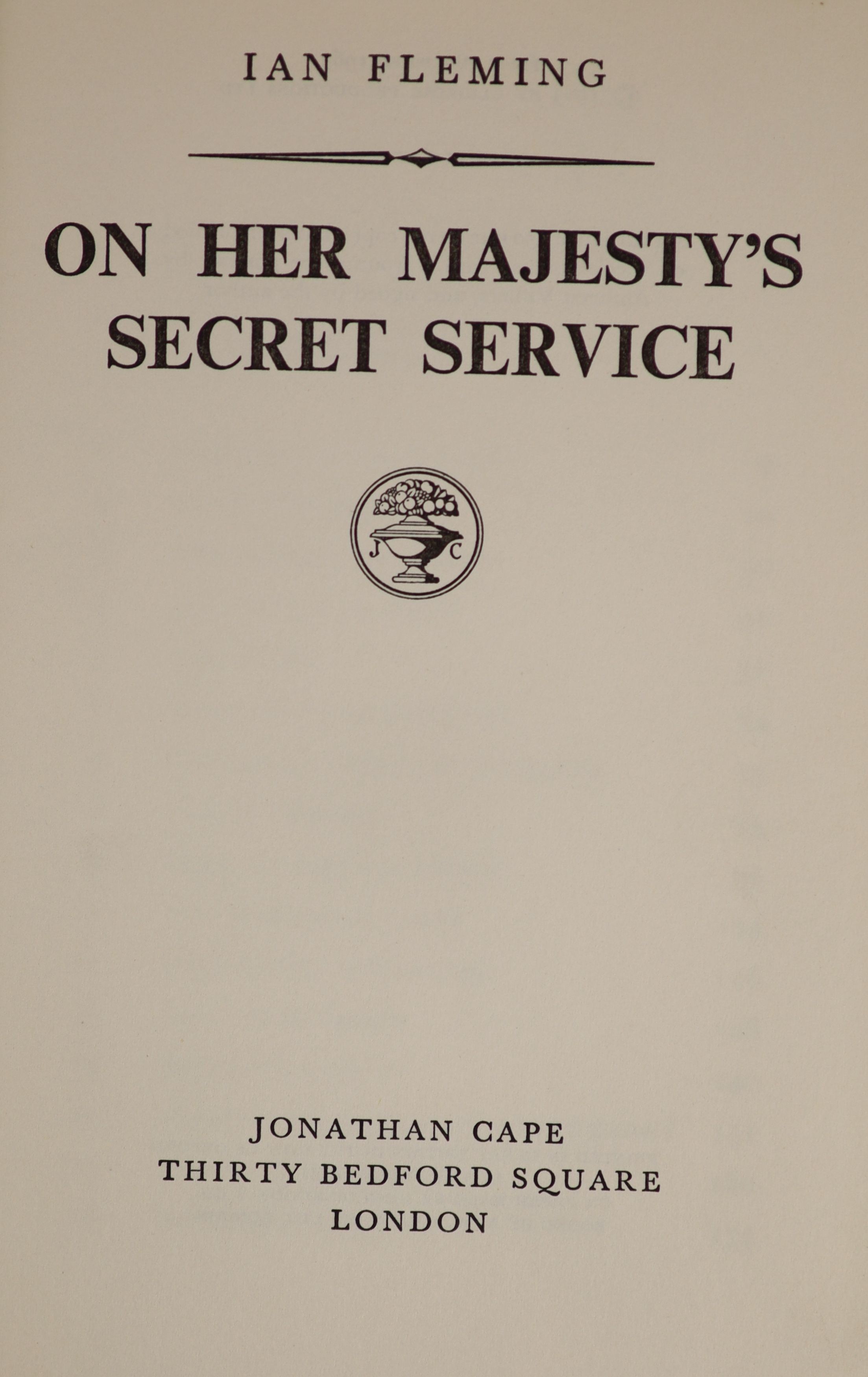 Fleming, Ian - On Her Majesty’s Secret Service, 1st edition, 8vo, black cloth, with white ‘’ski-track’’ motif, with torn and sunned unclipped d/j, owners inscription to front fly-leaf, Jon Cape, London, 1963